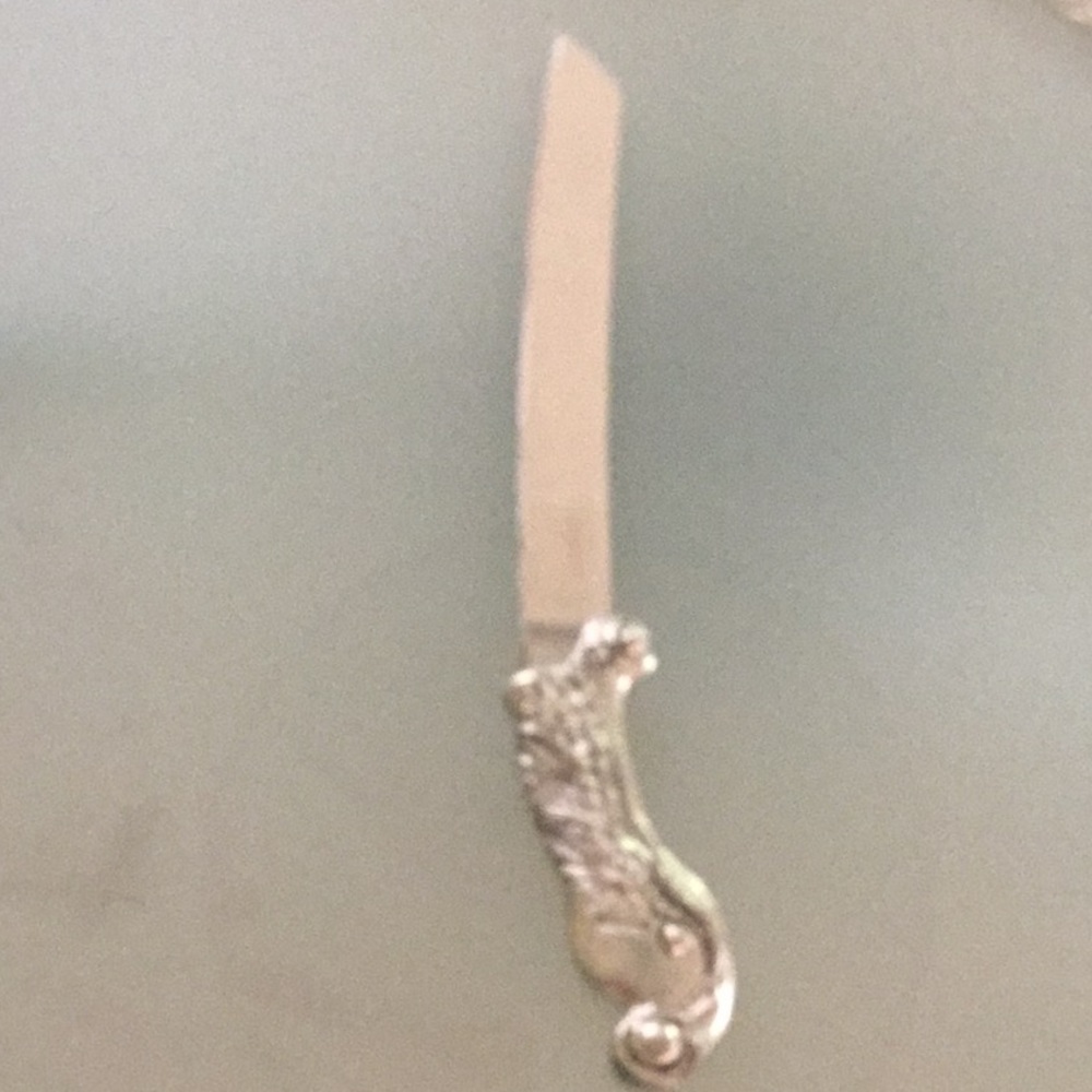 Pewter and stainless steel serrated knife